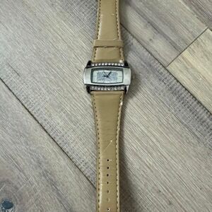 Tan leather watch with silver accents